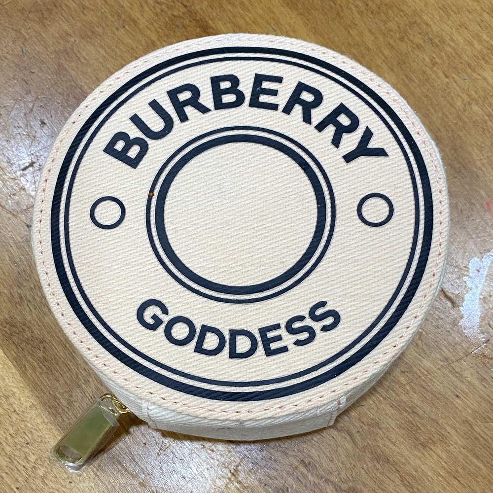 NWOT.  Burberry, small makeup bag.